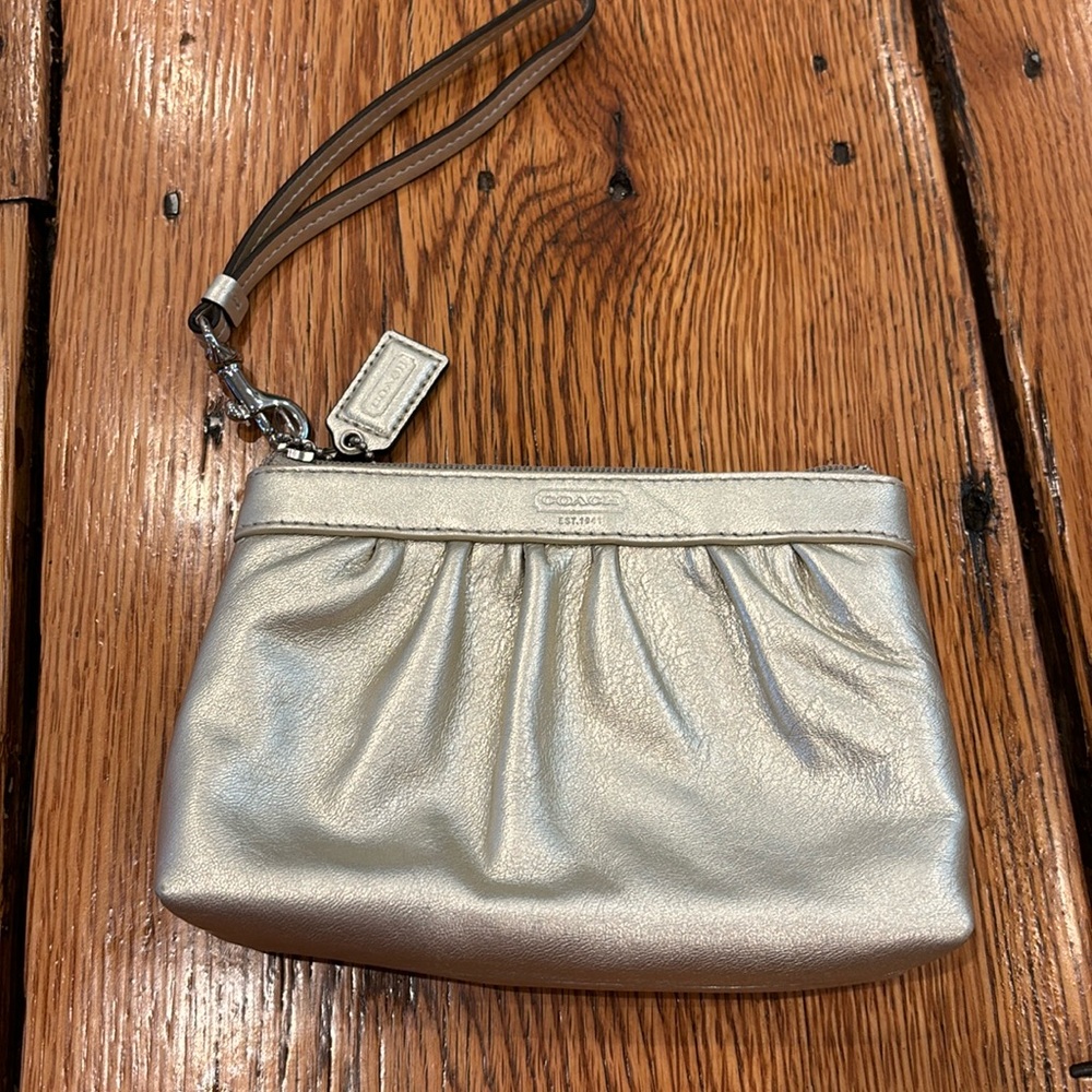 Coach gold leather wristlet
